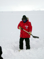 Eun shoveling snow